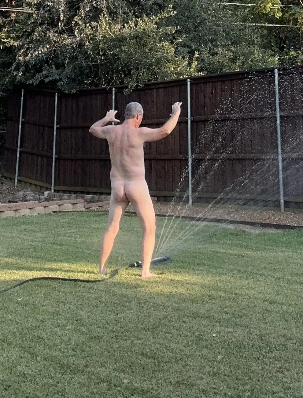 Just letting loose with my inner child and playing in the sprinkler