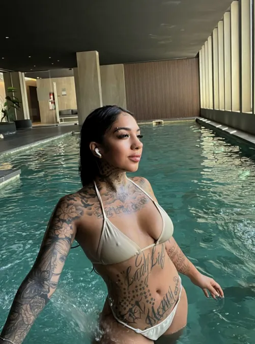 Naughty babe in a tiny bikini