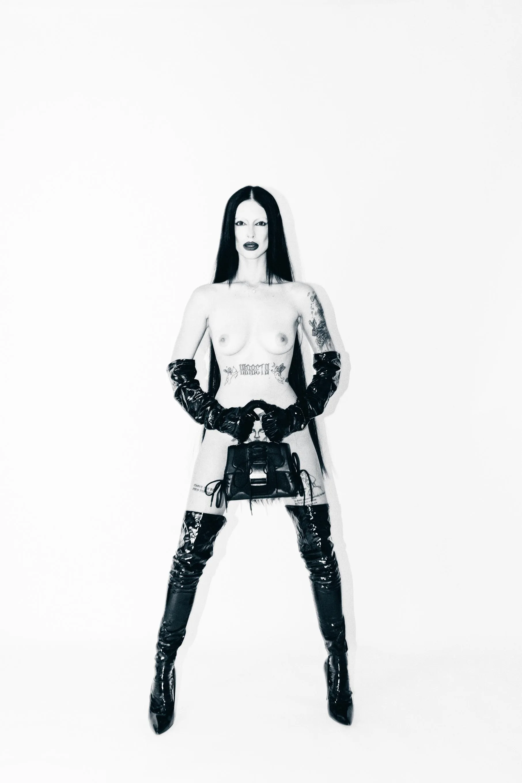 DarkMuseGlo with Steve Madden handbag...