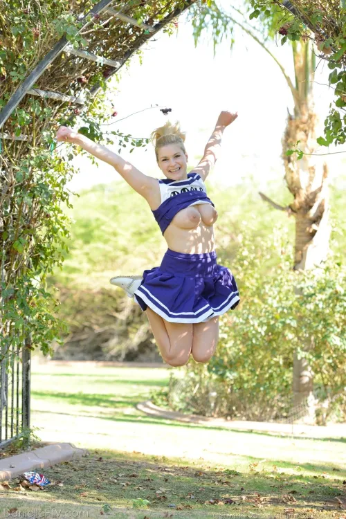 Topless Cheerleader Raises Spirits