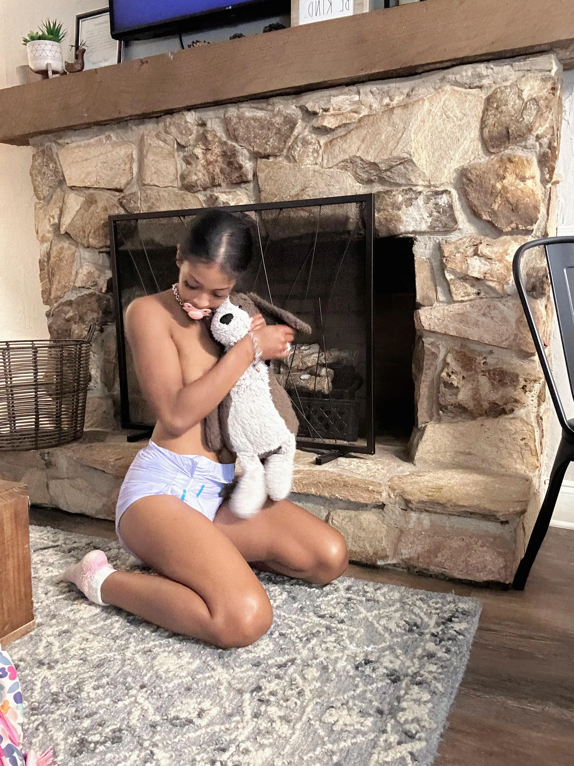 Being cute so daddy won’t notice how close I am to the fireplace