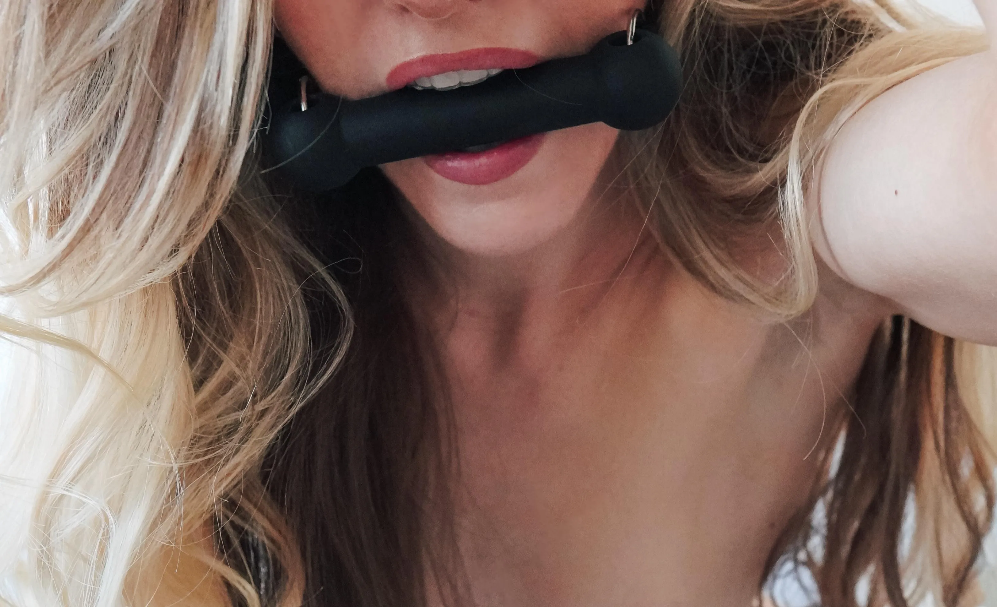 What you can’t see is the panties stuffed in my mouth behind the bit gag