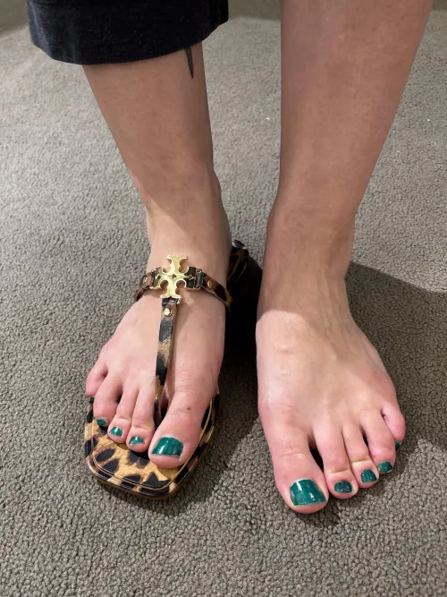 Feet in a little thong sandal