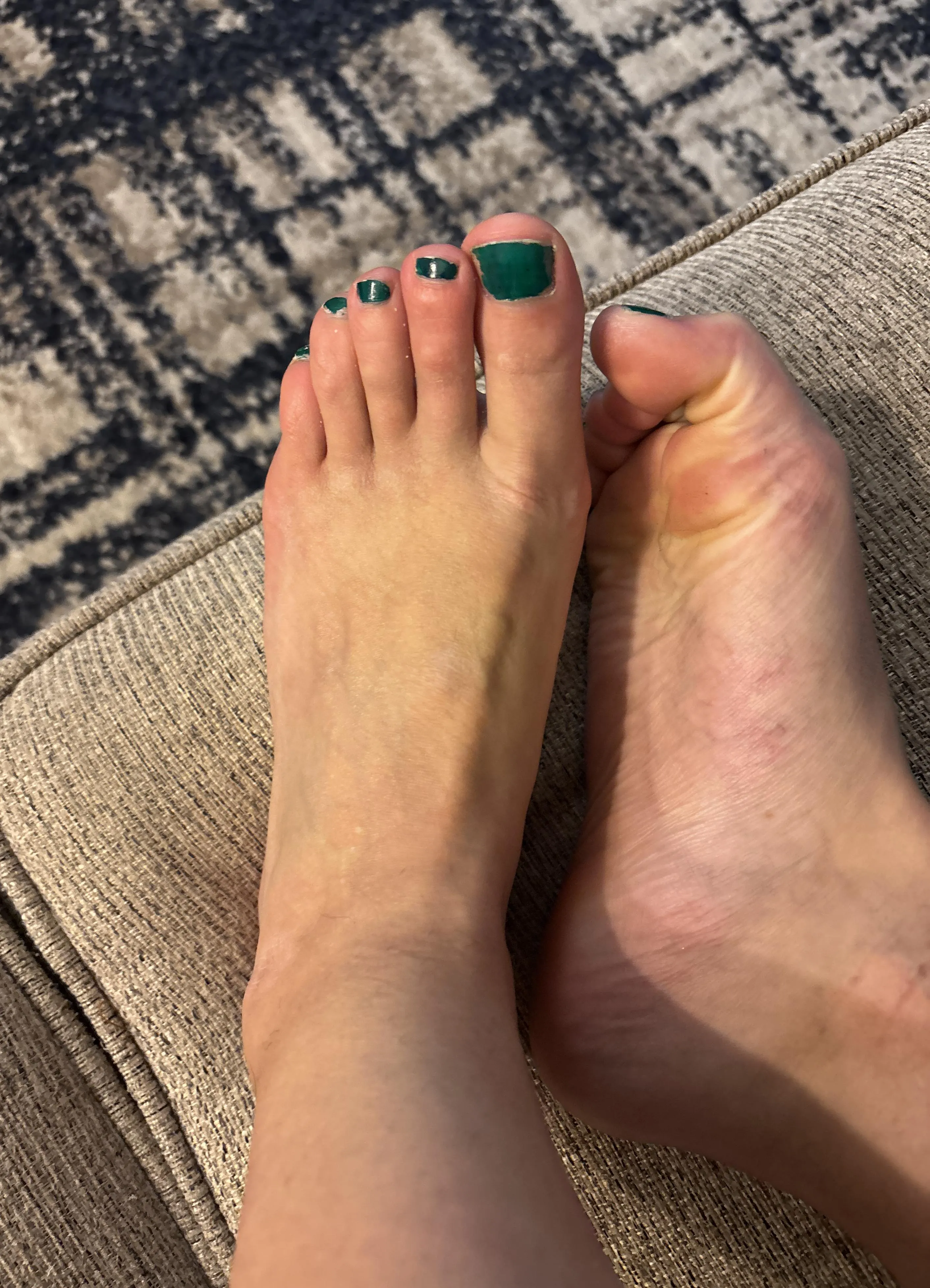 Cute toes on the couch