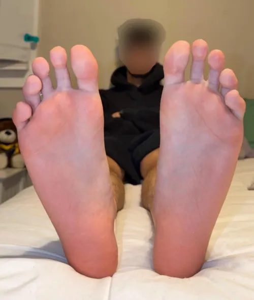 stinky feet propped up right where you can kneel at the edge of my bed & worship them 😈