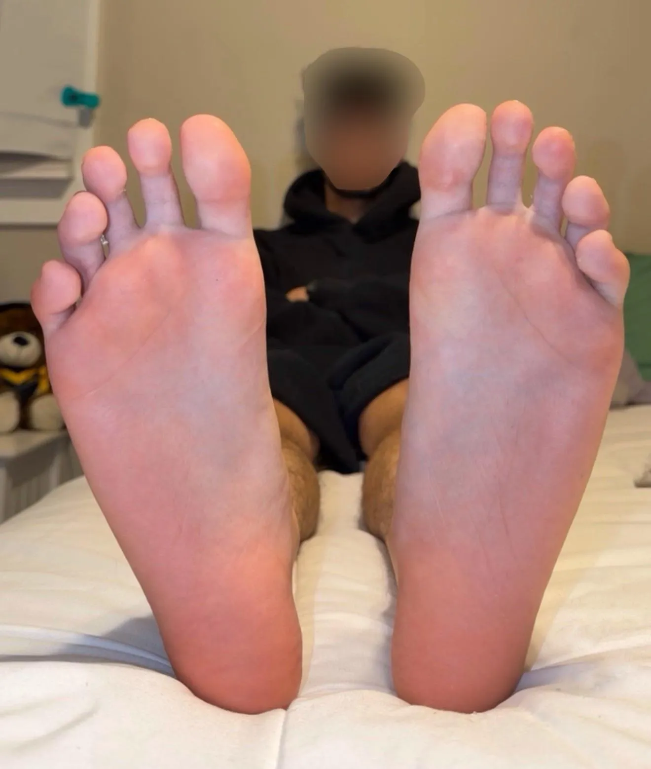 stinky feet propped up right where you can kneel at the edge of my bed & worship them 😈