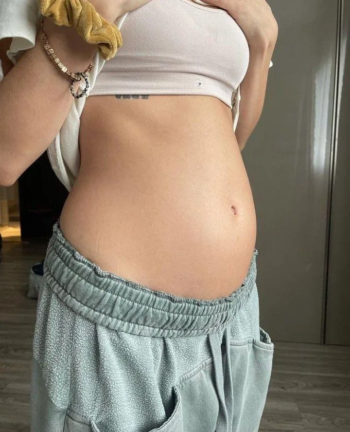 What do you think of my growing belly