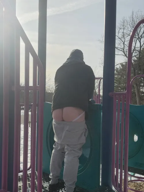 Mooning on the jungle gym
