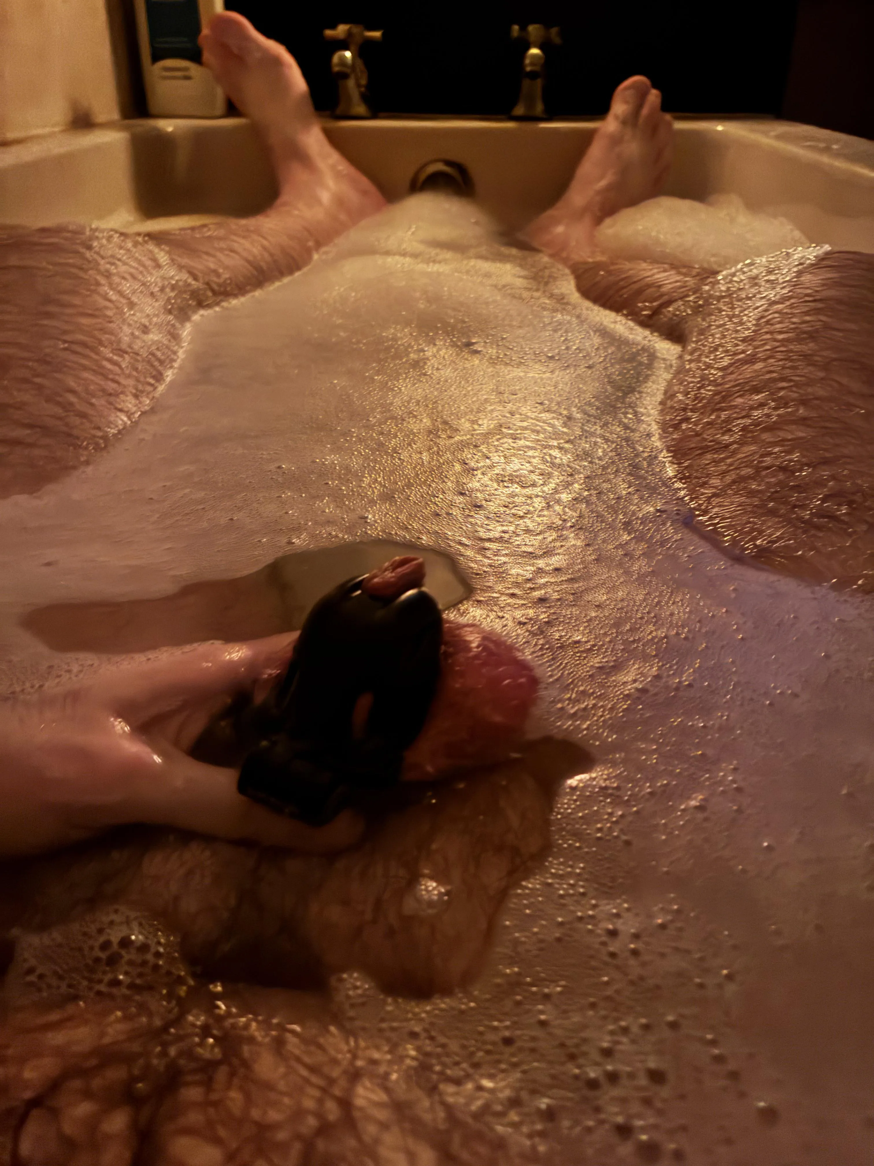 If you have a bad cold and take a bath to help, the cage stays on, right?