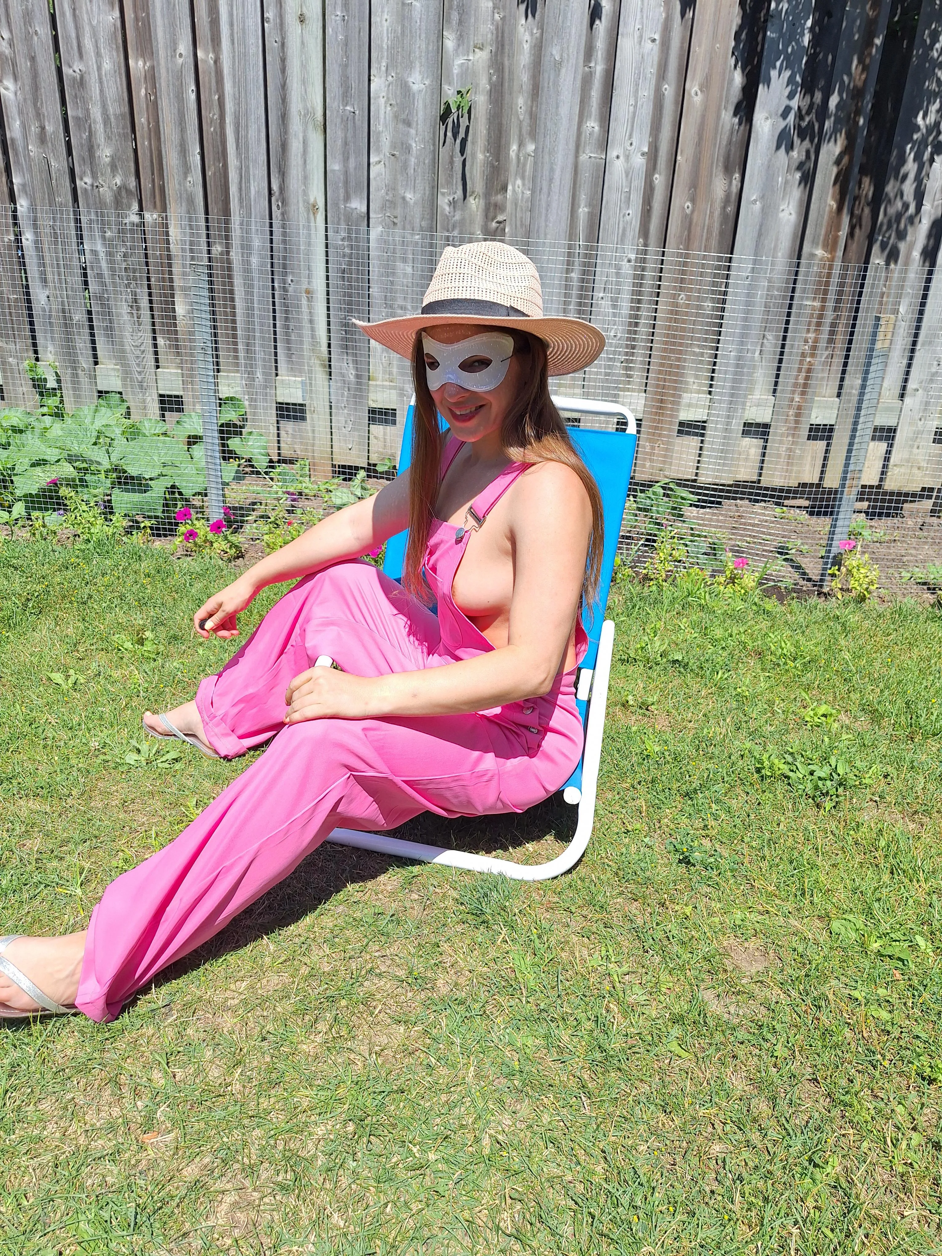 Relaxing in my pink overalls