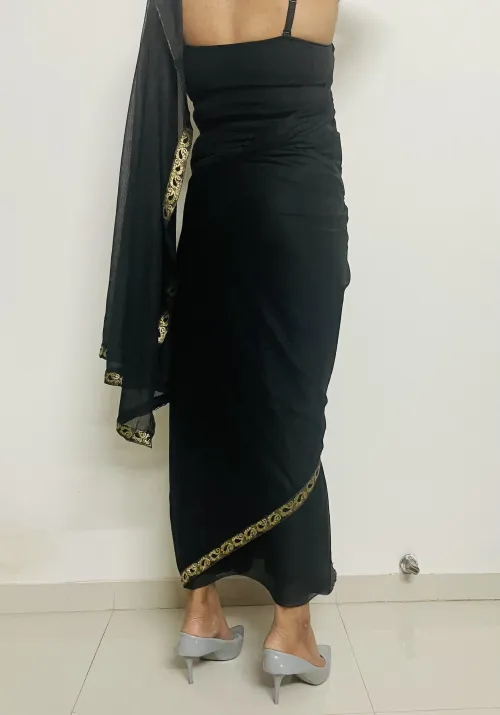 Indian CD in a Saree. Traditional dress with a modern draping.