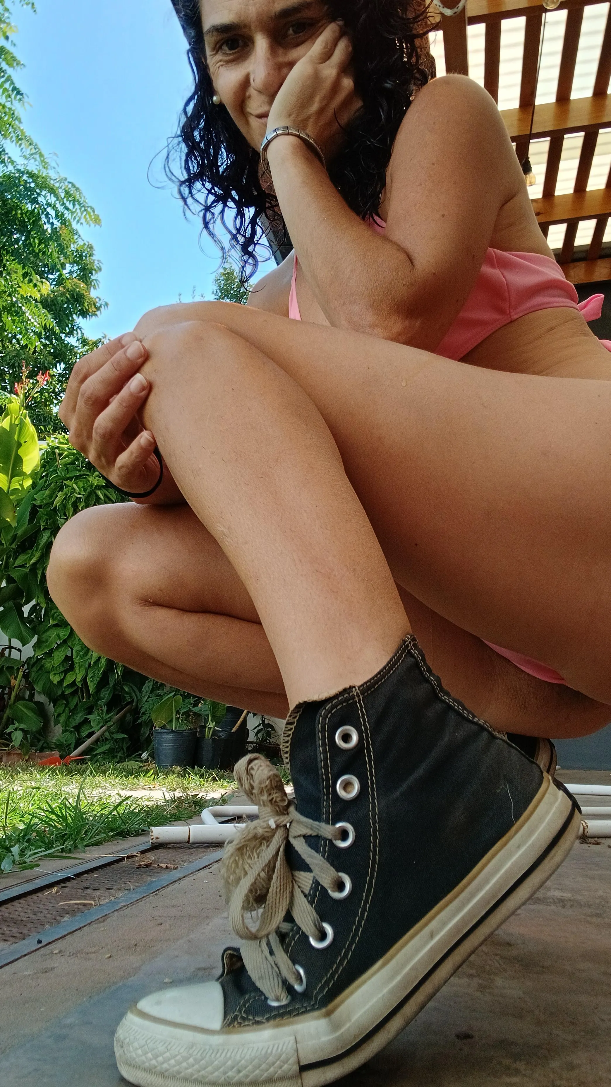 Adorable from every angle. A woman who enjoys the good life.