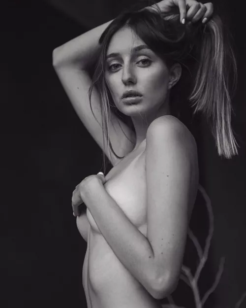 Holding back her hair