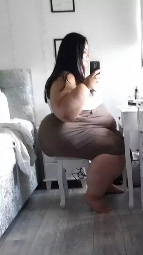 I can hear this stool trying not to collapse under her