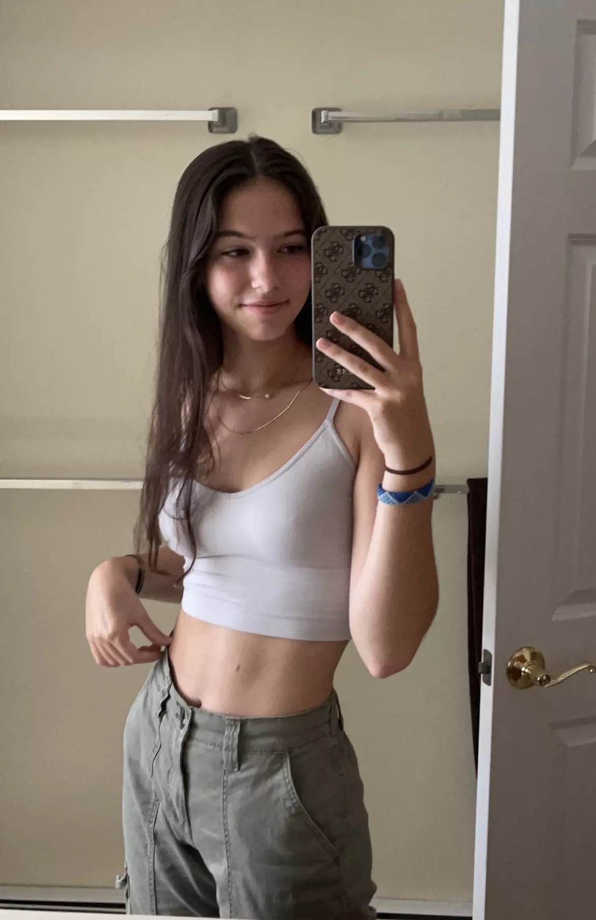 Loose pants, tight crop top