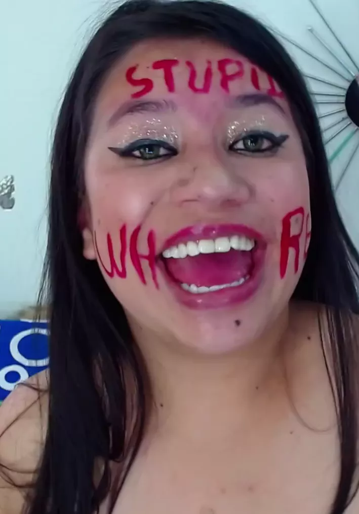 look how happy she is to be labelled a stupid whore <3