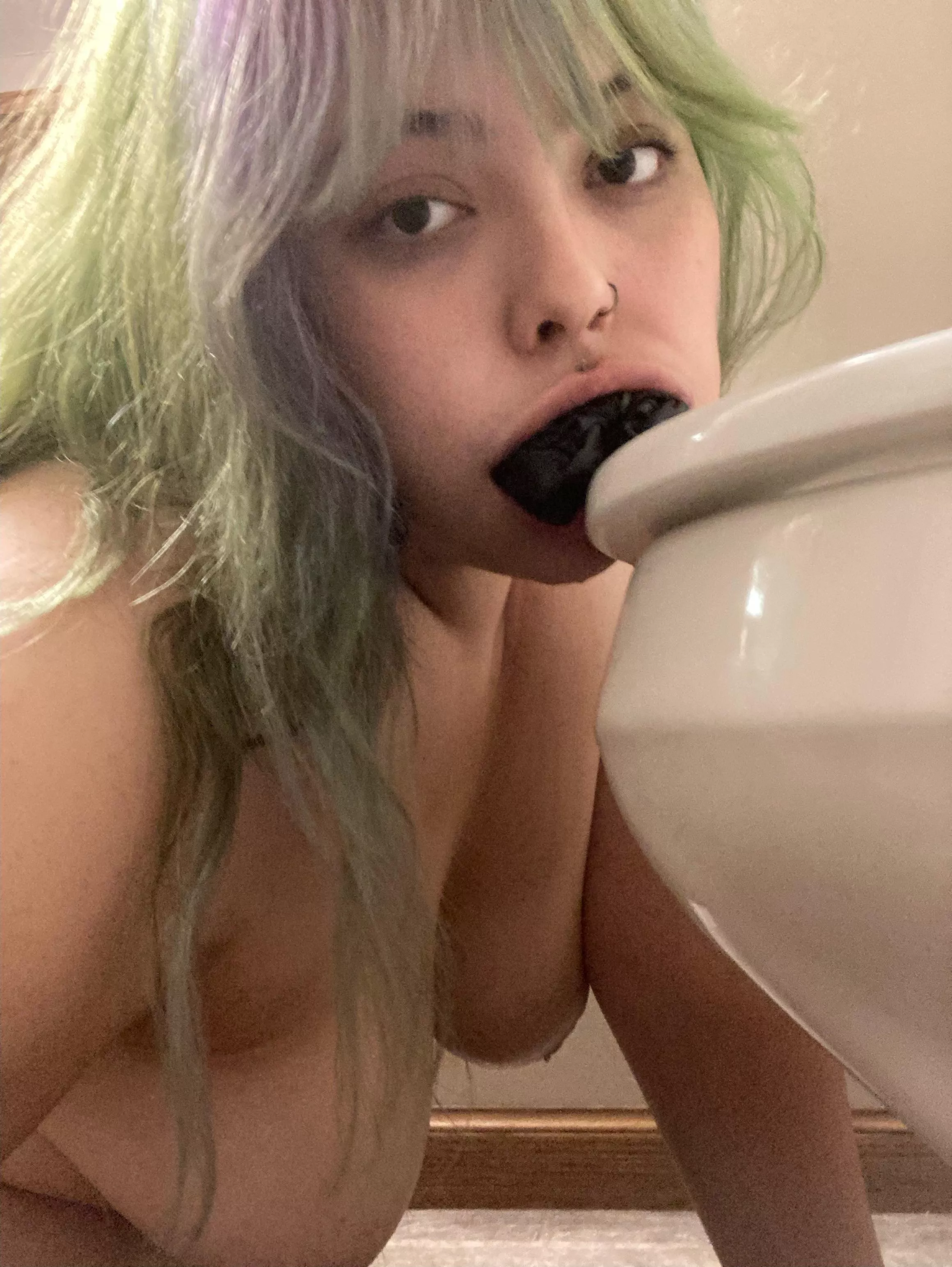 Making her kiss the toilet with her panties in her mouth