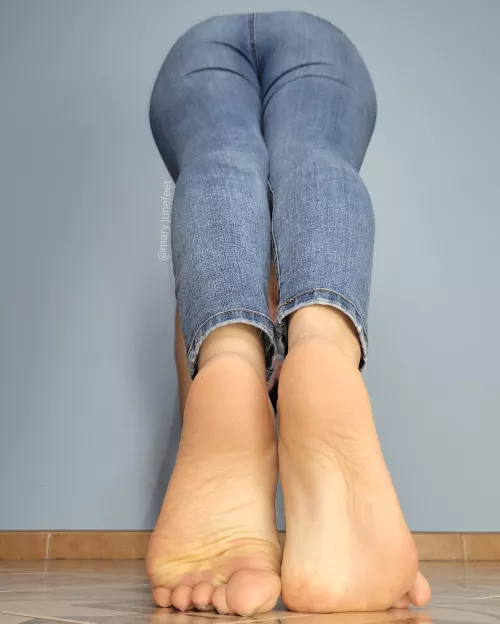Orange soles and jeans.