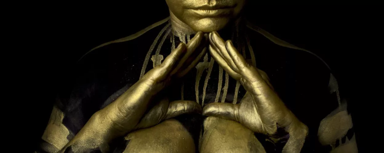 Gold, shadows, and a hidden message.