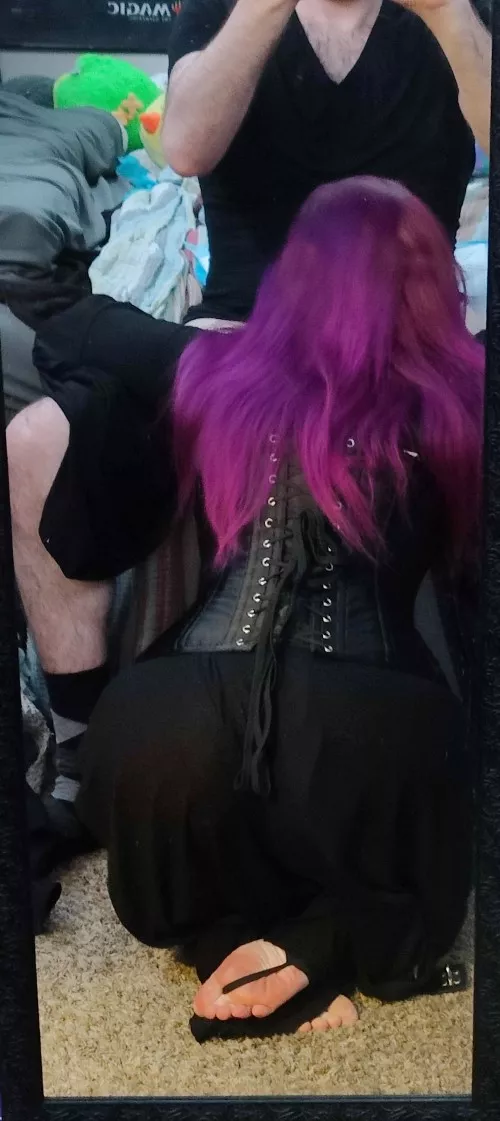 Gave him a blowjob in a friend's bedroom during a BDSM party, and he decided to snap a pic.