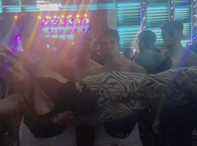 Big tits quite literally being passed around by guys at a festival, got less blurry pics to show btw aha
