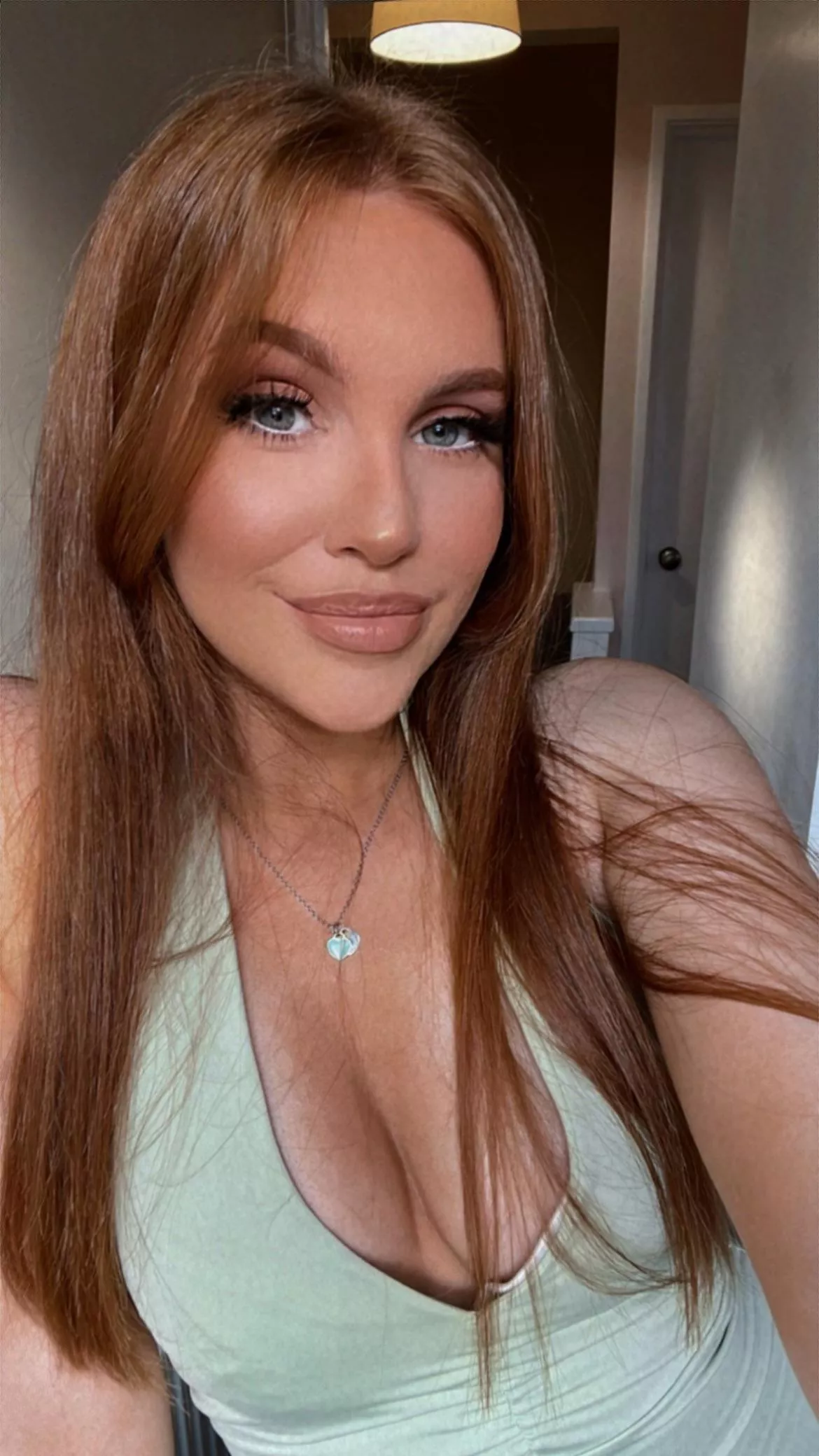 Petite but curvy natural redhead