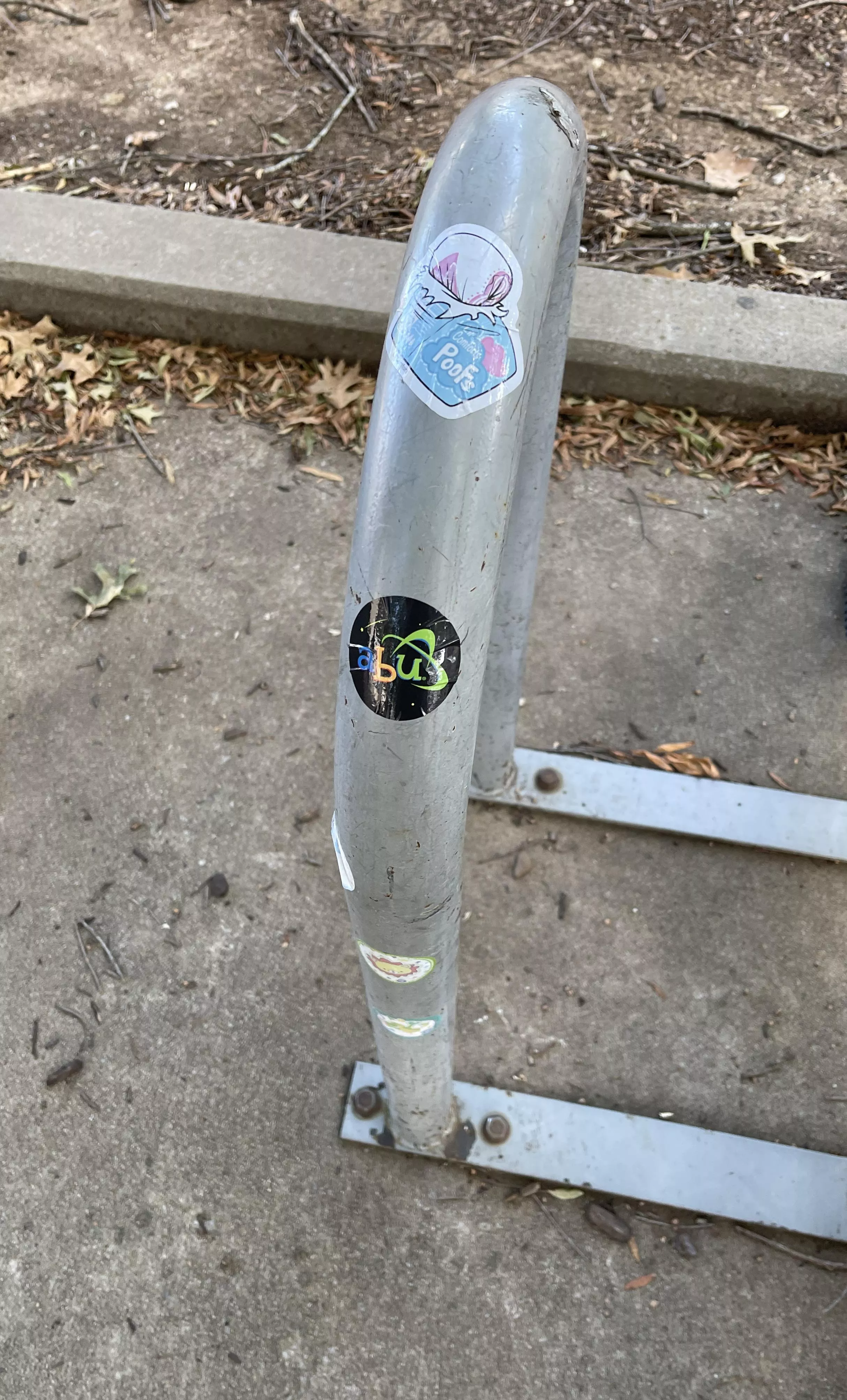 ABDL stickers on a bike rack at University of Arkansas