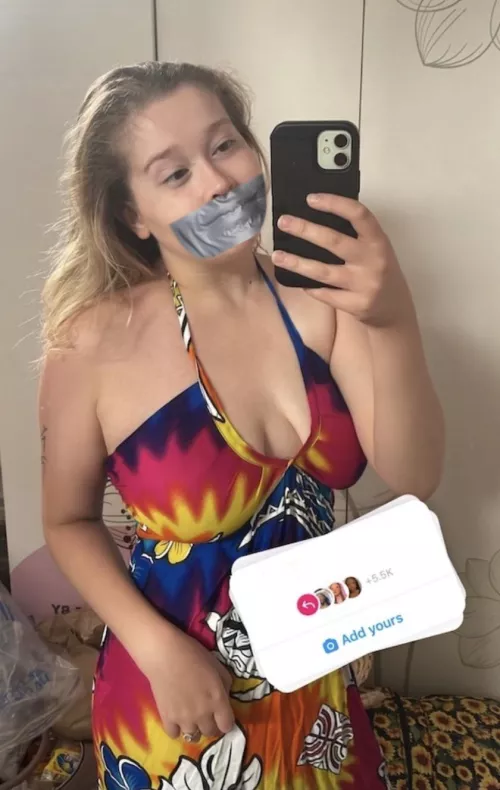 Annalise with her milkers tape gagged