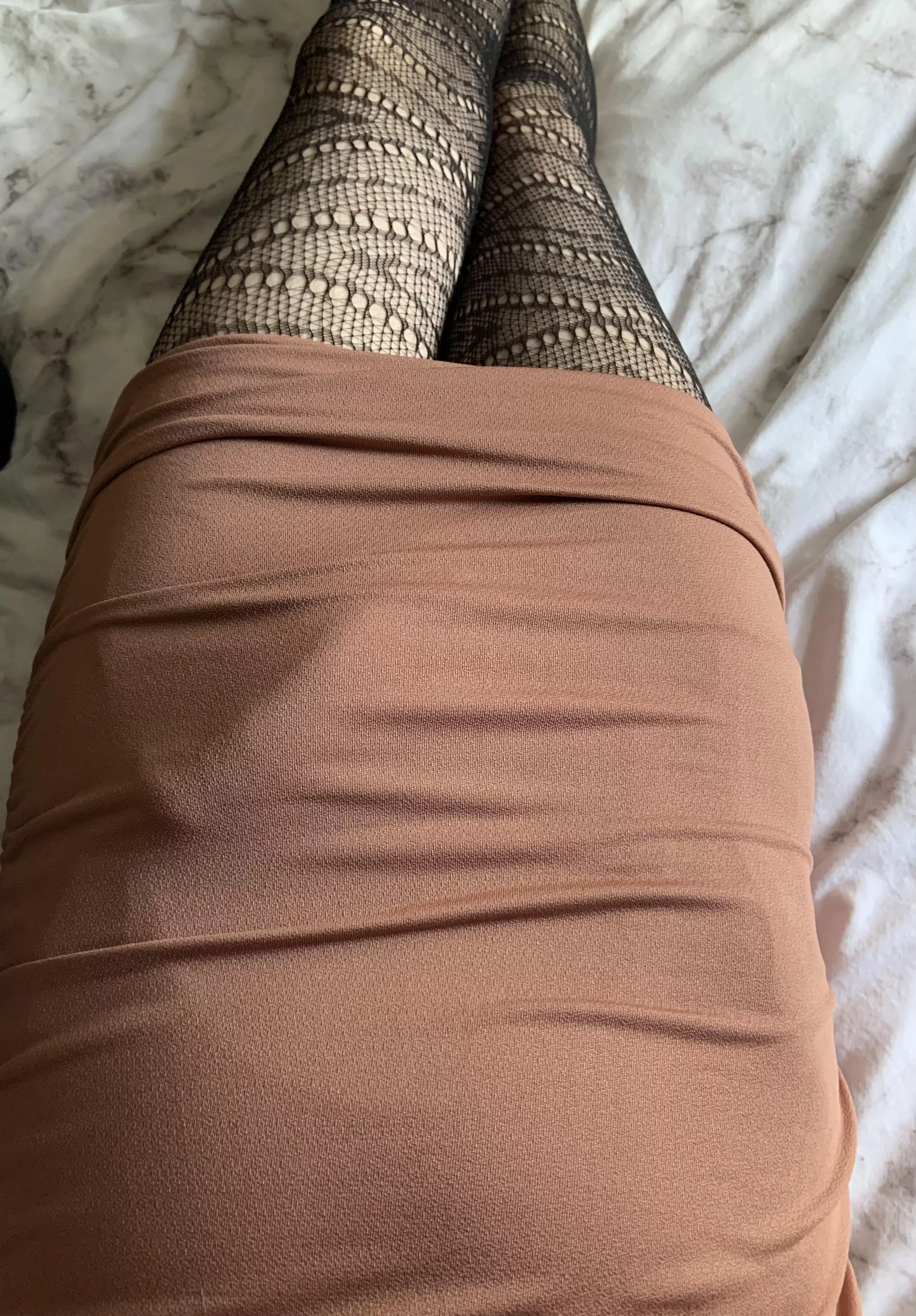 Just laying in bed in the tightest dress I own.