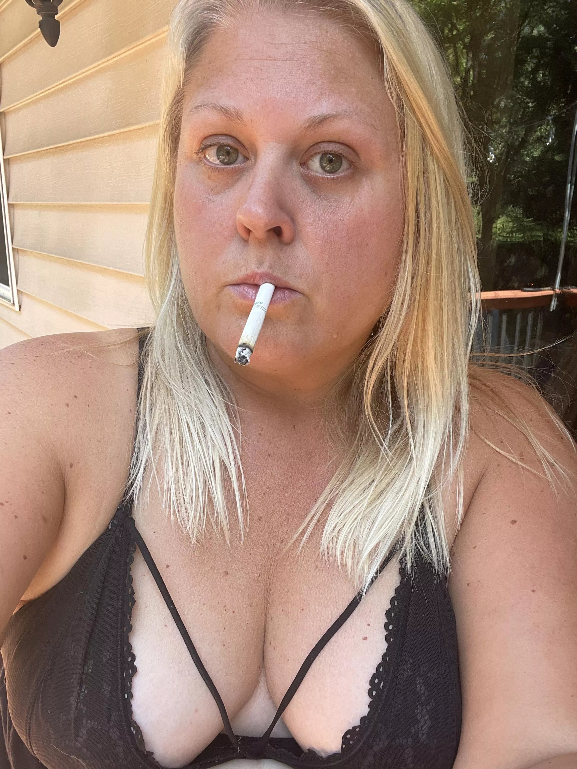 Dangling a Marlboro Light 100 menthol in my bra outdoors!