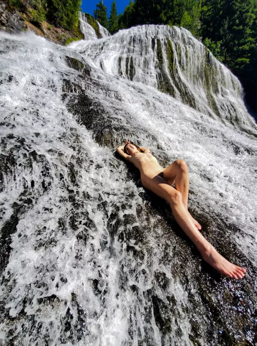 Casually laying on a waterfall 💦😋
