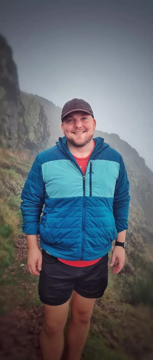 Here's a pic of me hiking on a rainy day in Edinburgh for my 10 year cake day