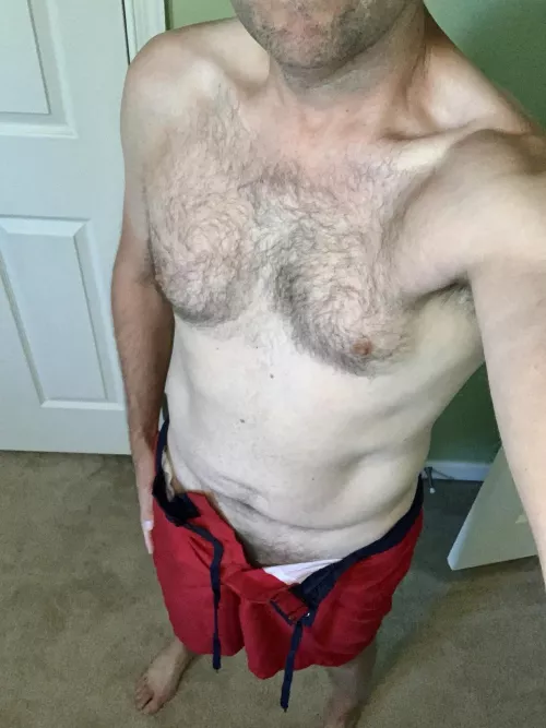 Almost ready for the beach. Can you help tie my strings?