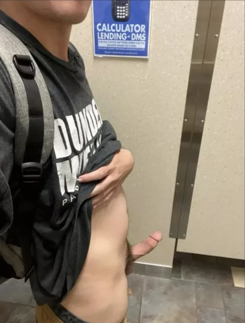 Jerking off in the bathroom before class