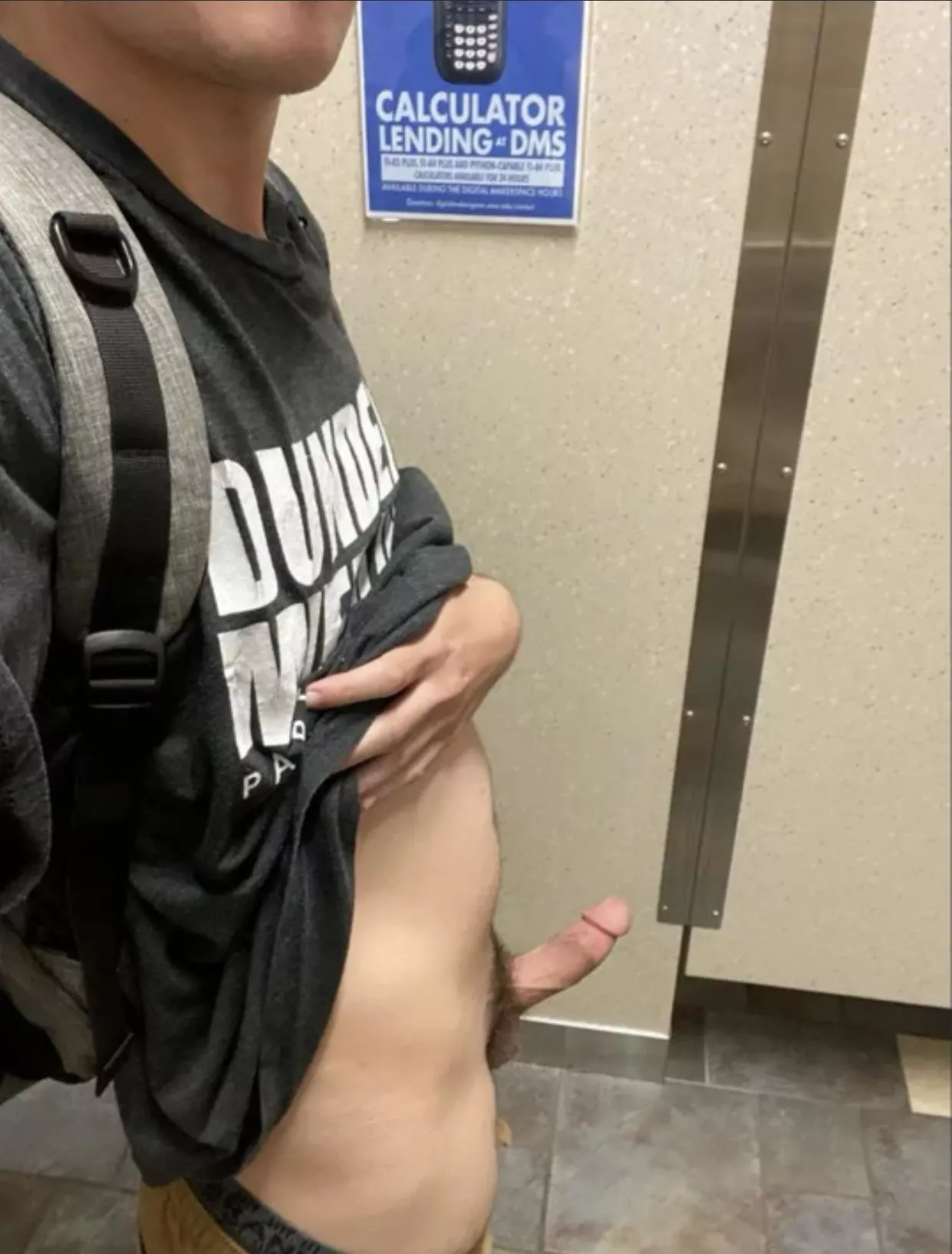 Jerking off in the bathroom before class