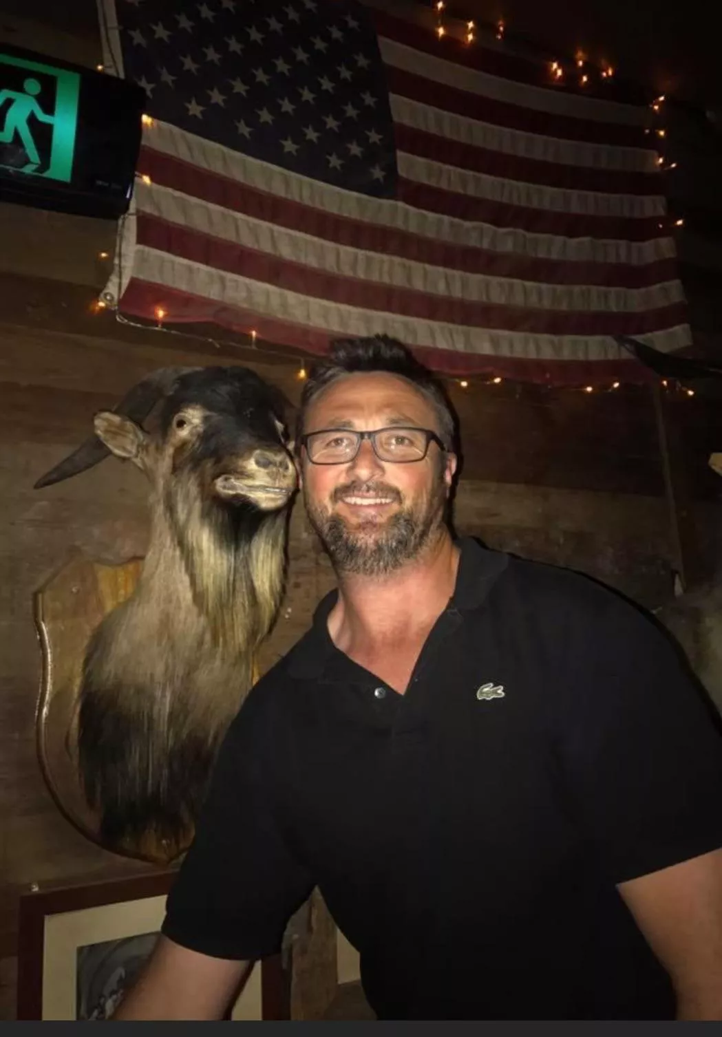 Save me from this animal….I’m the one with glasses …… 😉