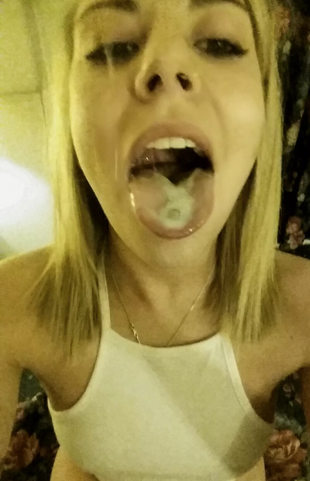 Showing Off the Cum on Her Tongue Piercing Showing Off the Cum on Her Tongue Piercing