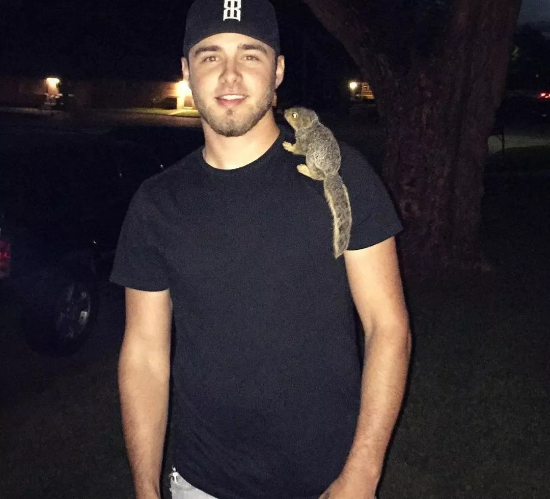 Enjoy this lil baby squirrel. was cute an sweet.