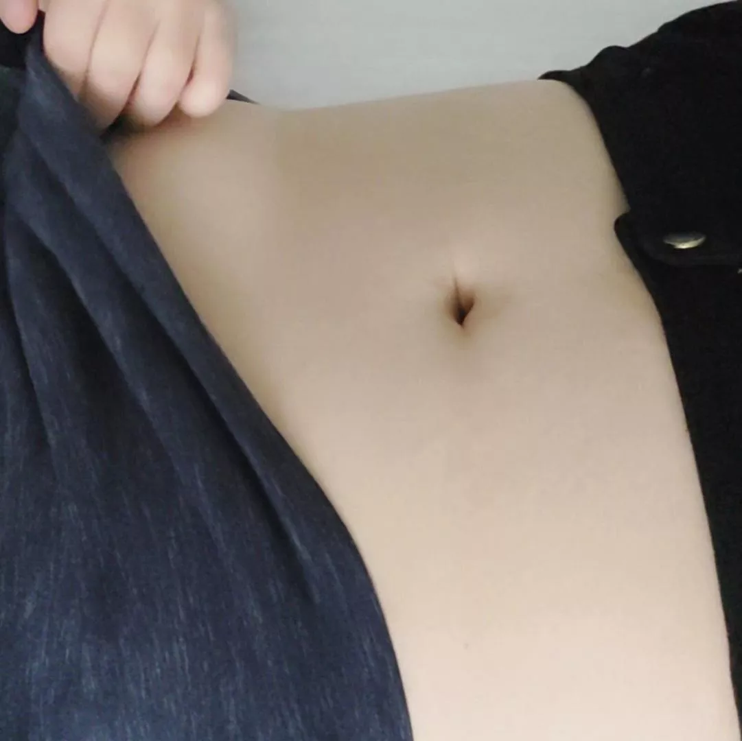 Lying in bed and showing off my button just for you.