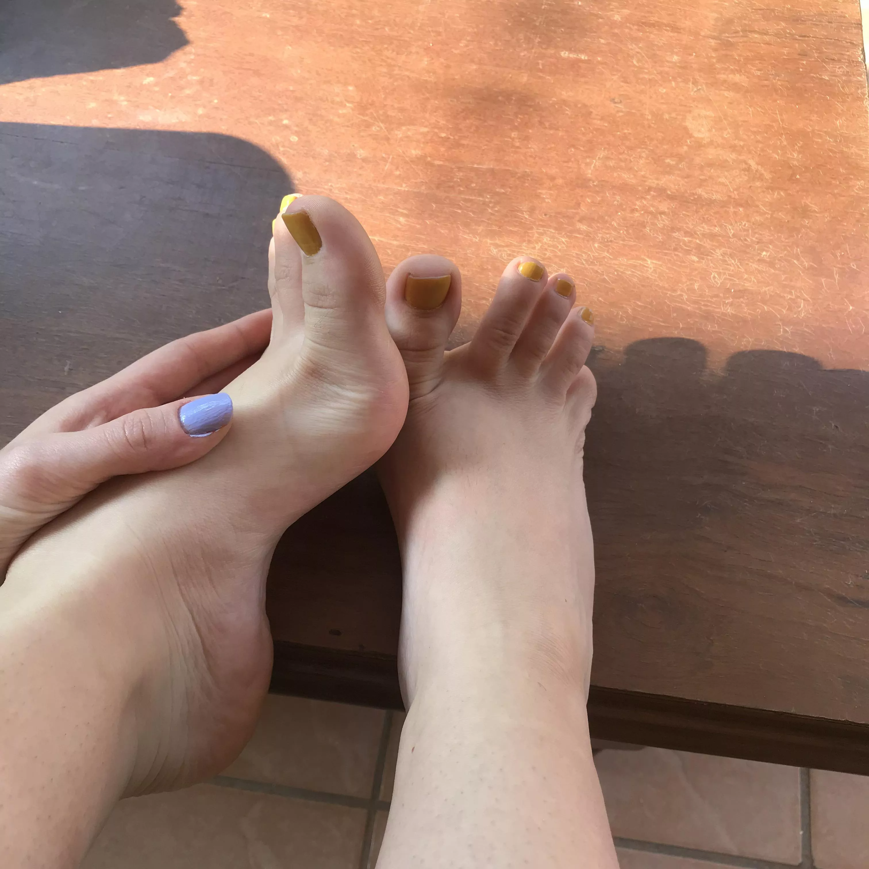 My cute toes this morning. Yellow on the toes and purple on the fingers
