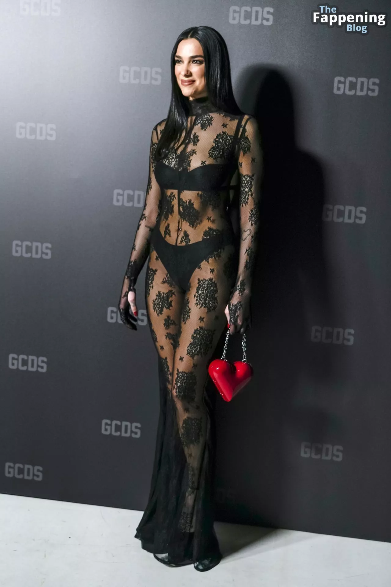 Dua Lipa Shows Off Her Sultry Style in a Black Sheer Lace Dress at the GCDS Show in Milan (28 Photos)