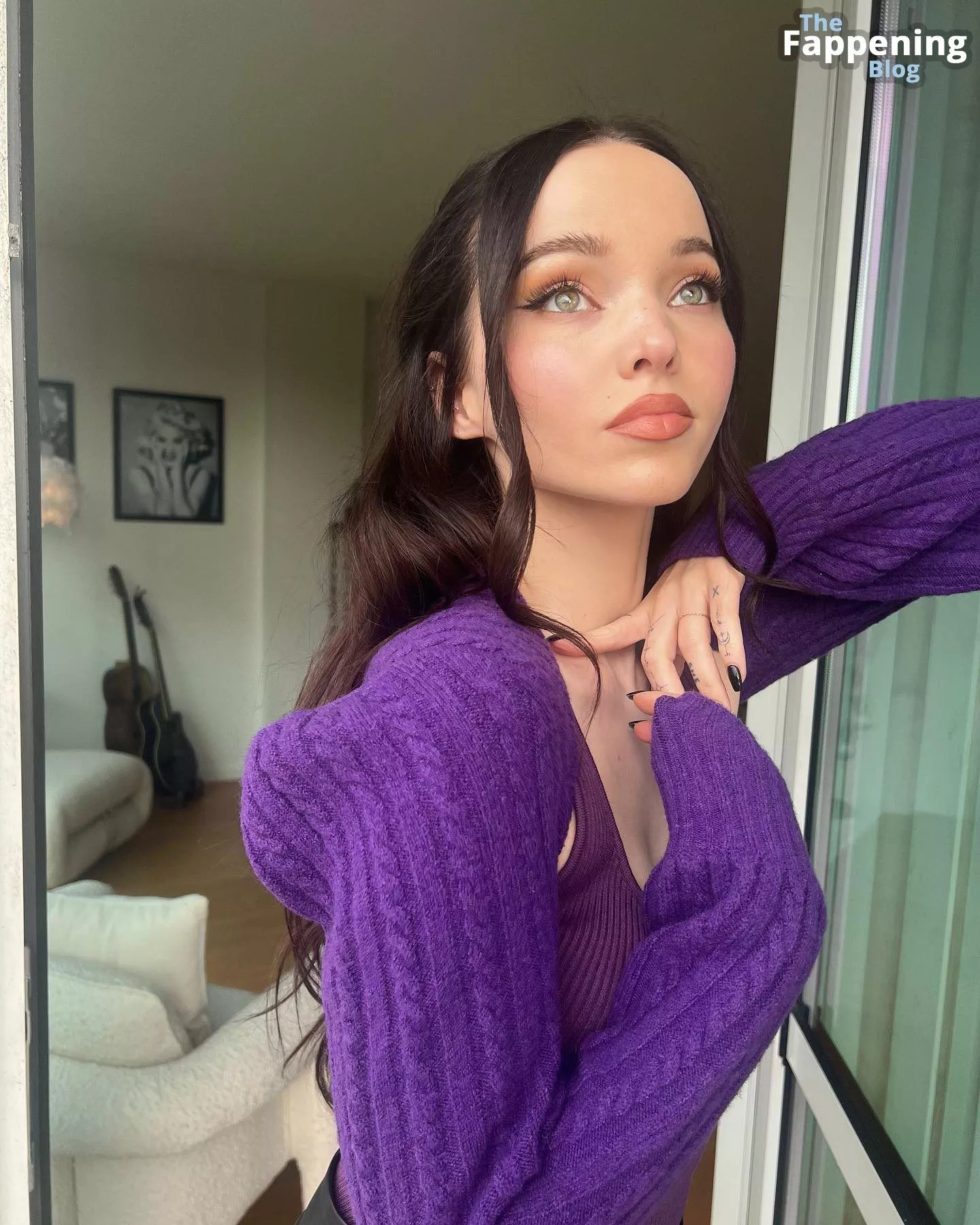 Dove Cameron Poses in a Purple Top for Her Followers (9 Photos)