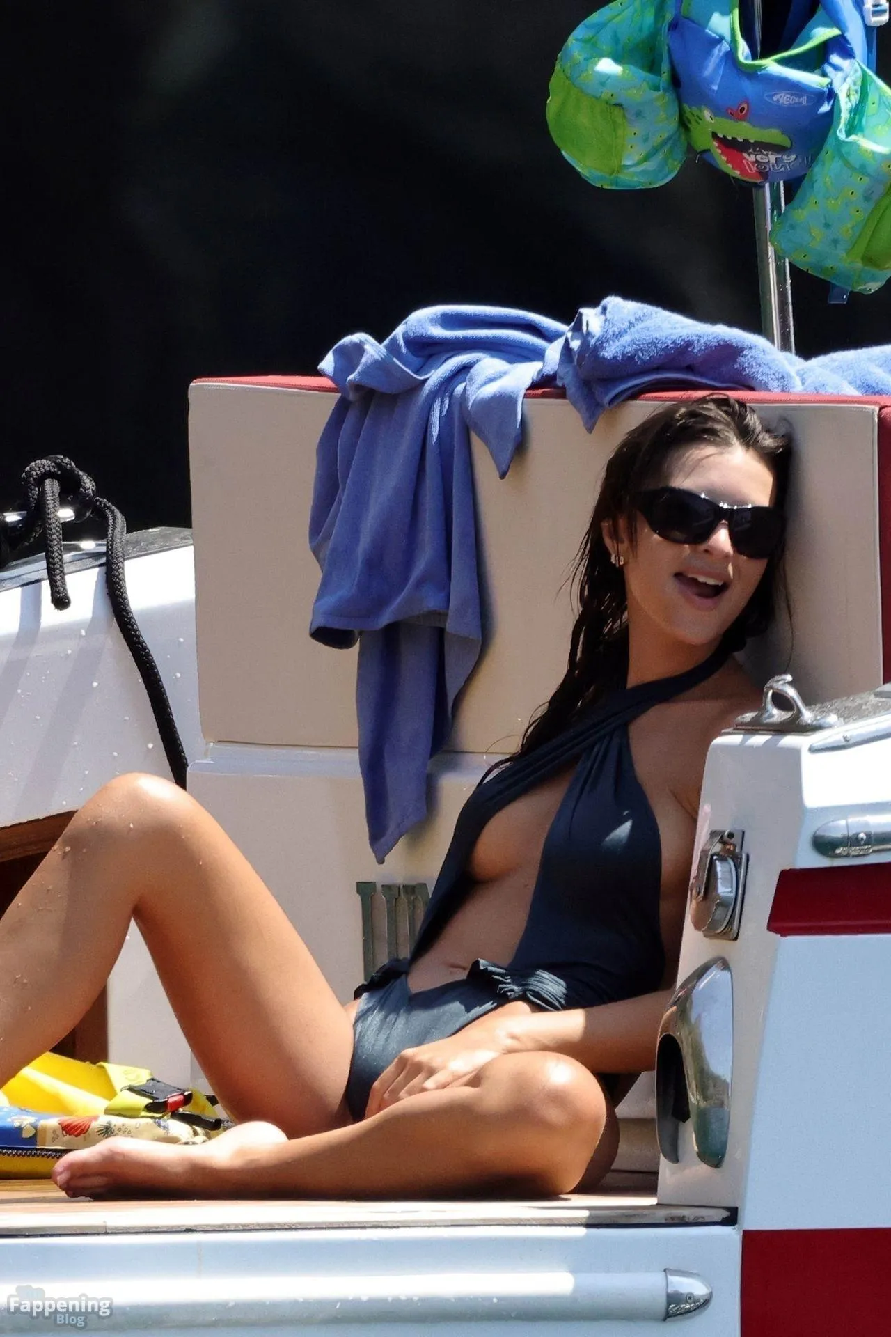 Emily Ratajkowski Shows Off Her Cheeky Side in a Black Swimsuit in Positano (15 Photos)