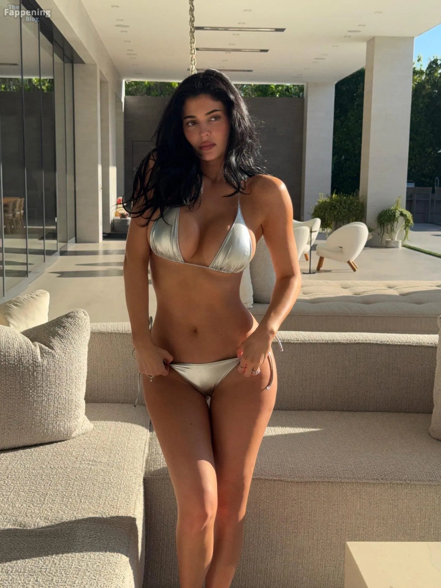 Kylie Jenner Shows Off Her Sexy Body in a Silver Bikini (7 Photos)