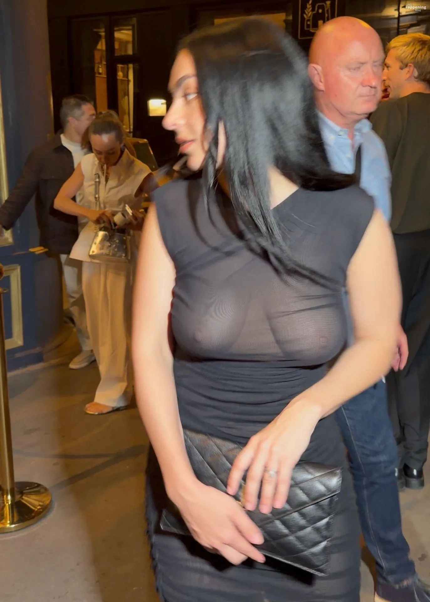 Charli XCX Flashes Her Nude Tits After the Saint Laurent Show in Paris (7 Photos)